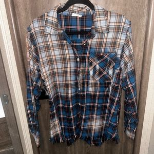 Distressed Flannel, size small. Purchased from local boutique. Worn once